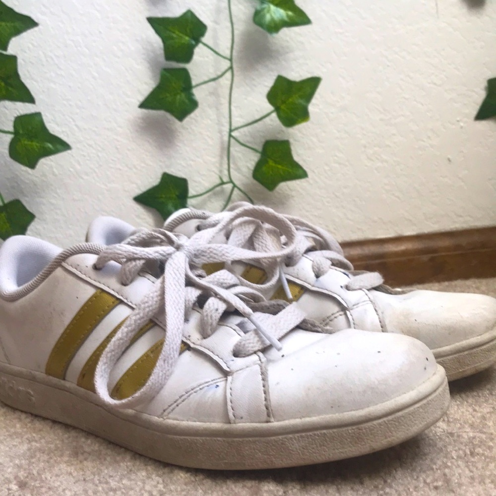 Gold adidas worn many times but still stylish and in good wearing condition.